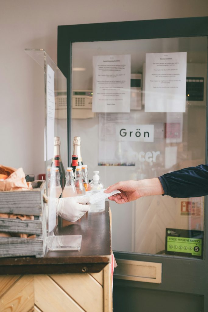 Customer reviewing receipt at restaurant counter