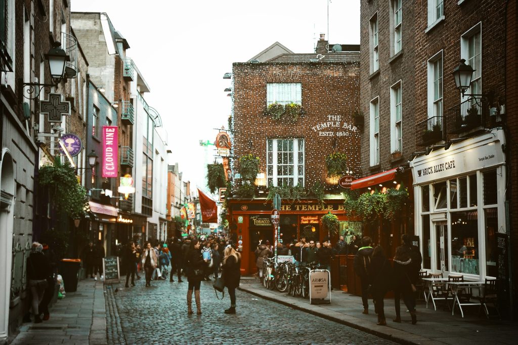 Temple Bar street in Dublin with busy pubs and restaurants
