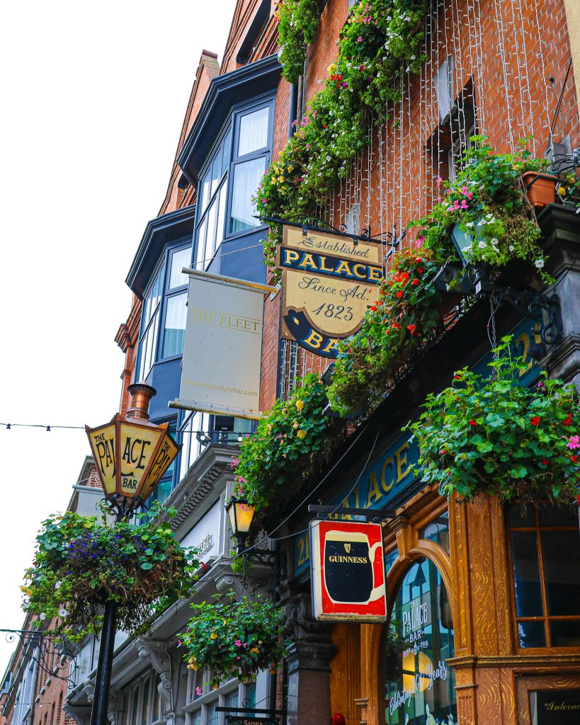 Traditional Dublin pub exterior with floral façade