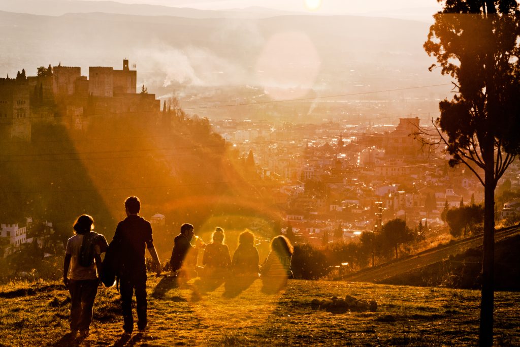 Enjoying the sunset and panoramic view of Granada from a hillside