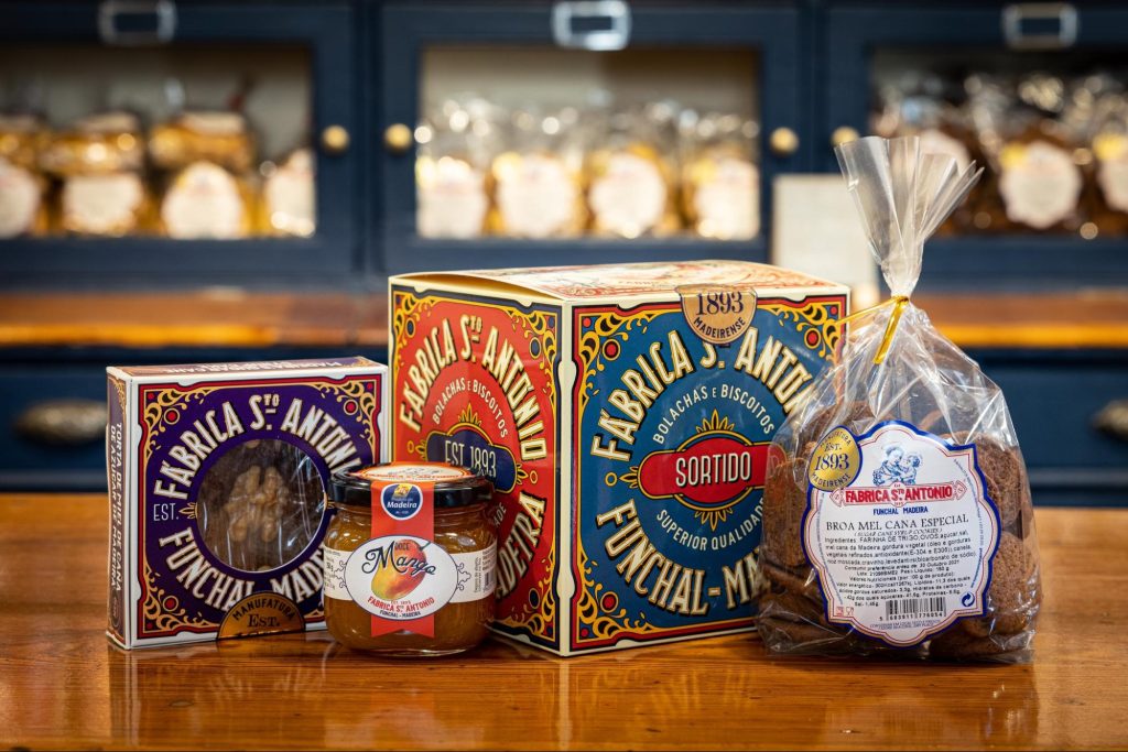 Traditional edible souvenirs from Madeira including local fruit jam and classic Madeiran pastries beautifully packaged as gifts.